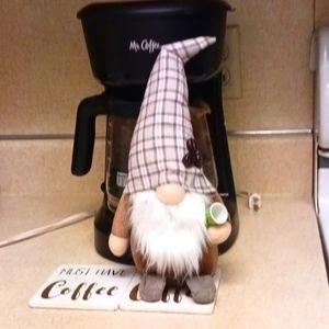 Gnome that loves COFFEE BOUGHT AT LOCAL ARTIST BOUTIQUE, LIGHT BROWN HOLDING MUG